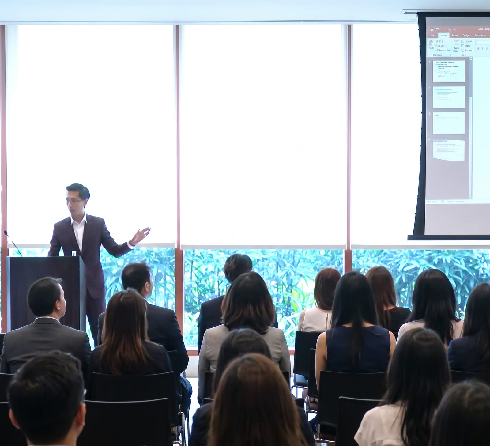 Karl leading a Power BI training session for a seated business audience